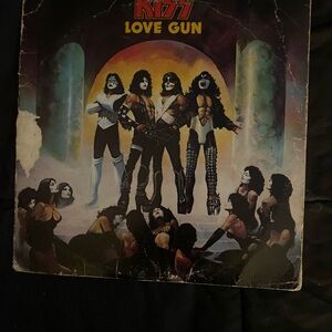 Vintage Kiss Love Gun Vinyl Record - Black and Orange Cover